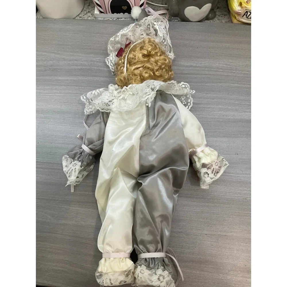 VINTAGE PORCELAIN DOLL IN CLOWN COSTUME
